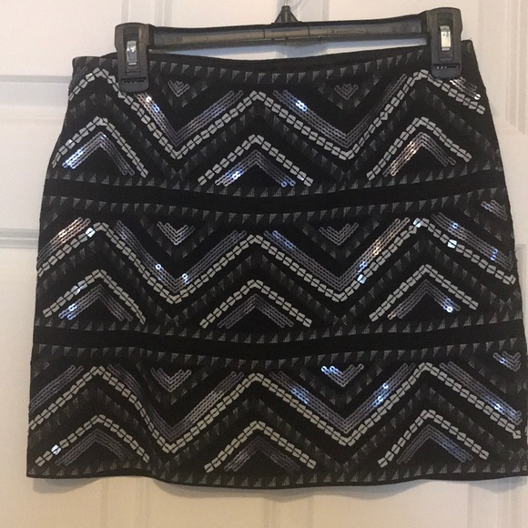 Express Dresses & Skirts - Sequin mini shirt